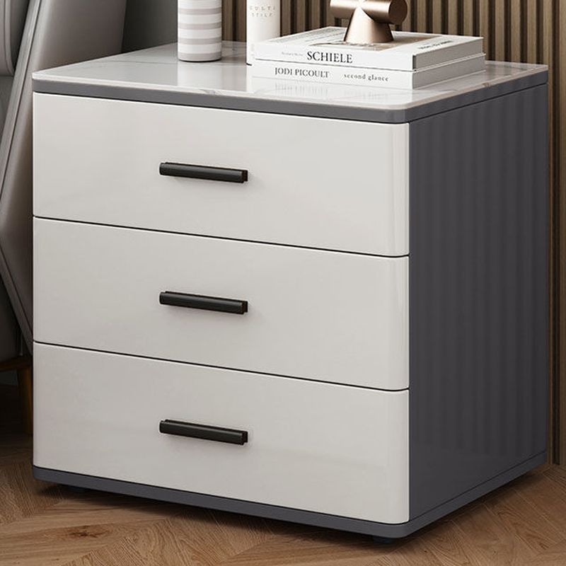 Modish Nightstand With 3 Drawers and Lumber/Stone Countertop, Featuring Leg