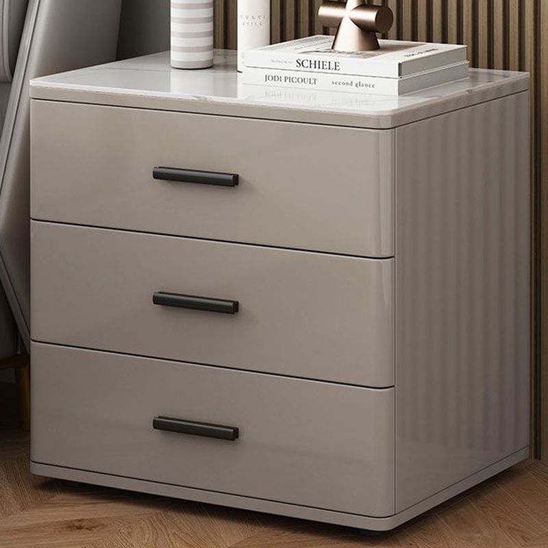 Modish Nightstand With 3 Drawers and Lumber/Stone Countertop, Featuring Leg