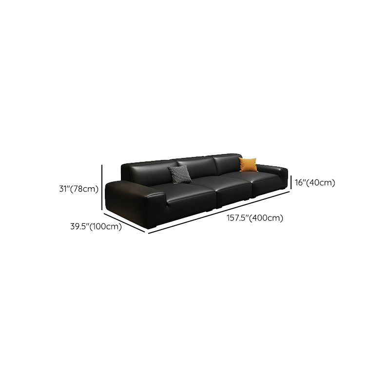 Extra Long Black Leather Sofa with Stain Resistant Feature and Two Pillows