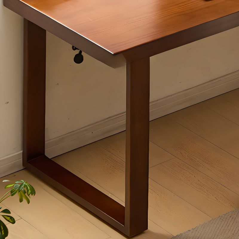 Casual Writing Desk with Built-in Outlets, Rust Resistant Sleigh Base, and Ink/Light Brown/Natural Pine Wood Top