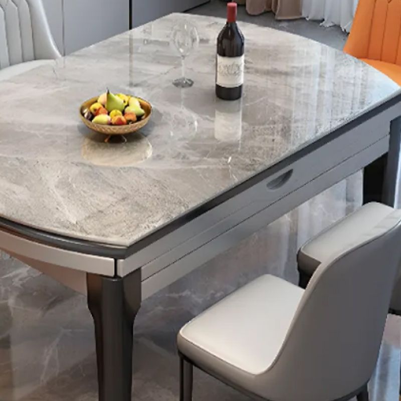 Simplistic Circular-shaped Dining Table with Slate Top and Fold-away Leaf