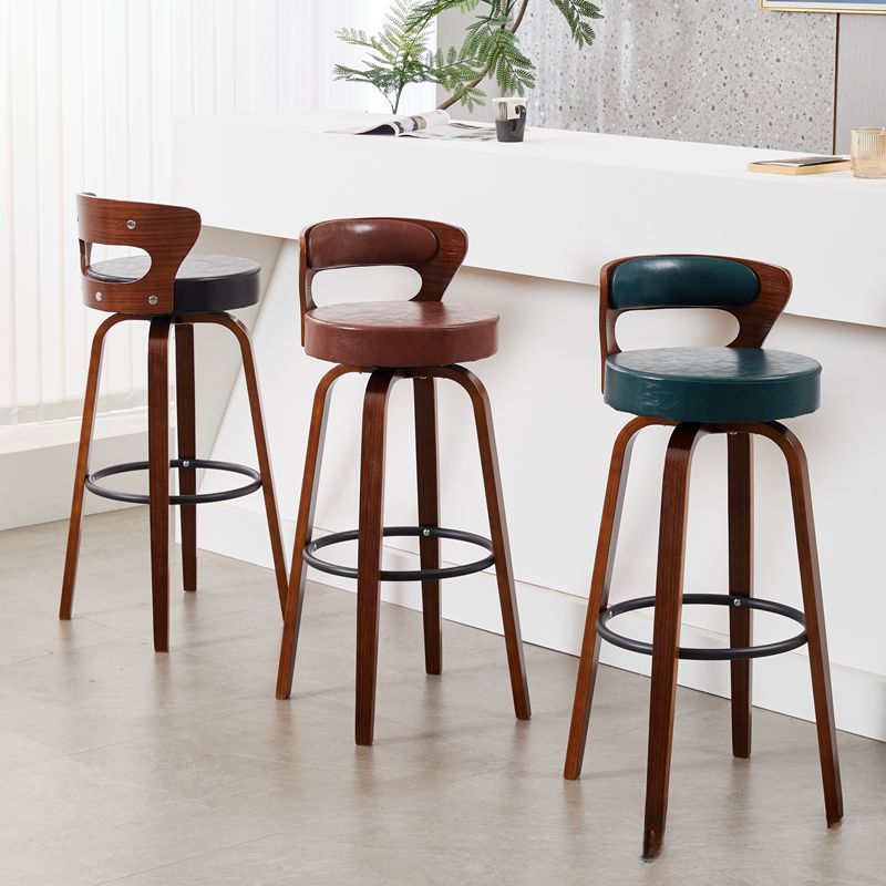 Casual Rawhide Bar Stools in Light Gray/Cream/Amber Color with Back, Turned Swivel, Round Top, and Leg Rest