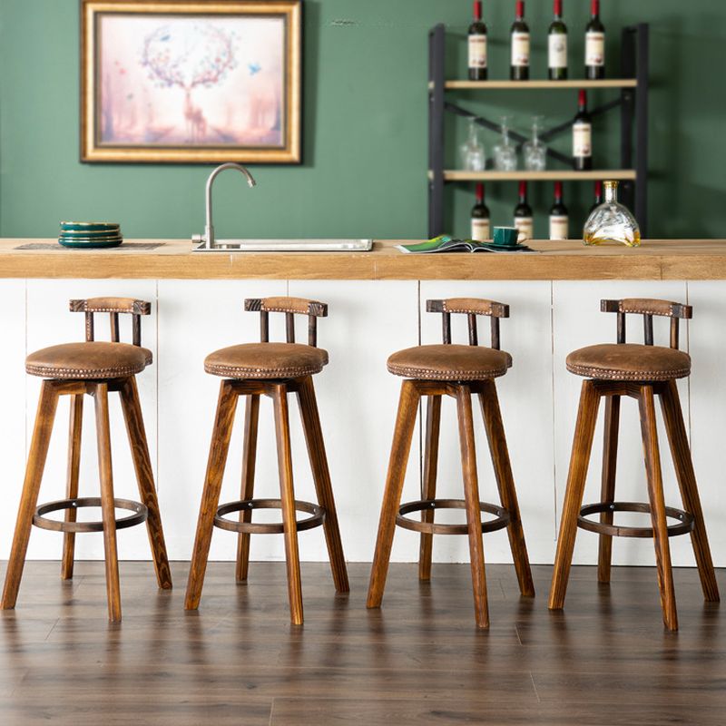 Casual Soft Seating/Rawhide Bar Stools in White/Lemon Color/Cognac with Back, Turned Swivel, Round Top, and Leg Rest