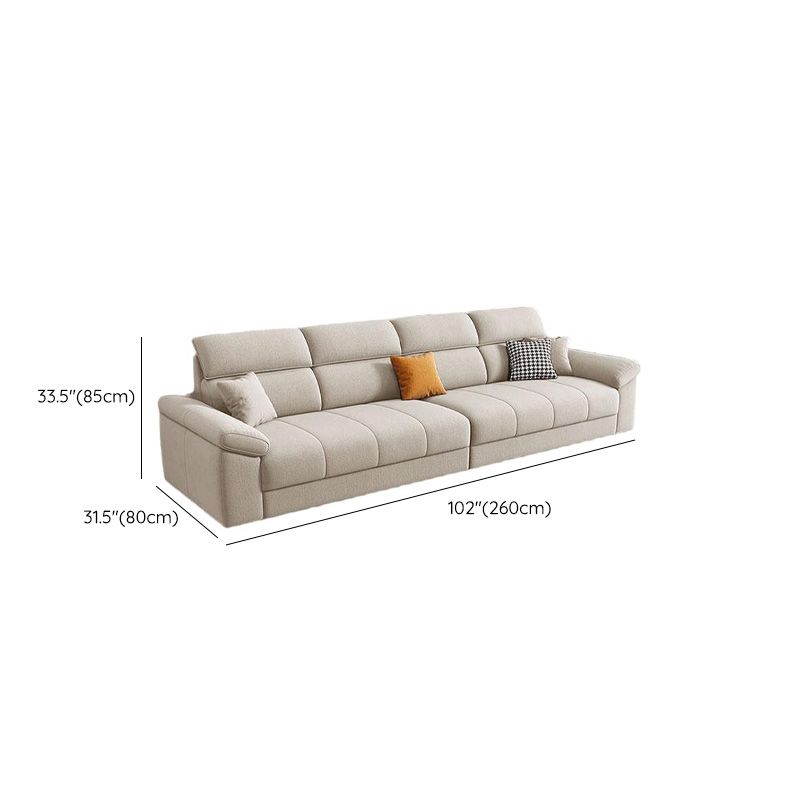 Standard Sofa in Tan with Armrest and 3 Pillows