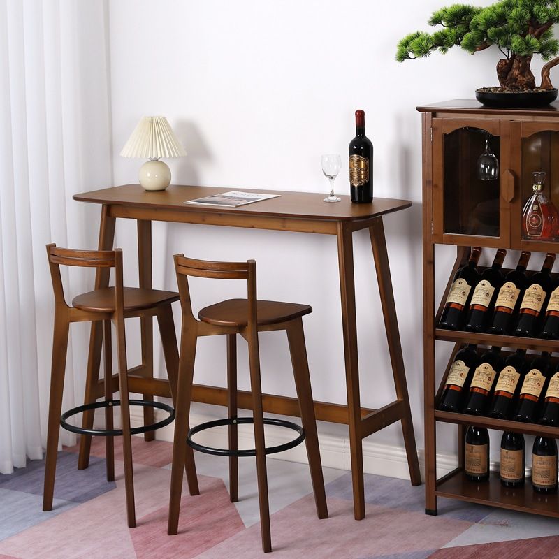Cosmopolitan Trestle Cocoa/Wood Color Rectangle Pub Table with Grain Wood Foot Support