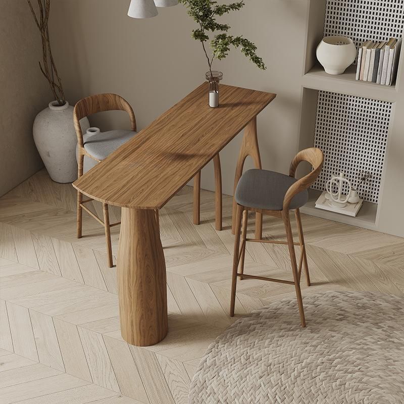 Coffee Wood/Natural Asymmetrical High Top Table in Natural Pine Wood with Three Legs and Upholstered Chair