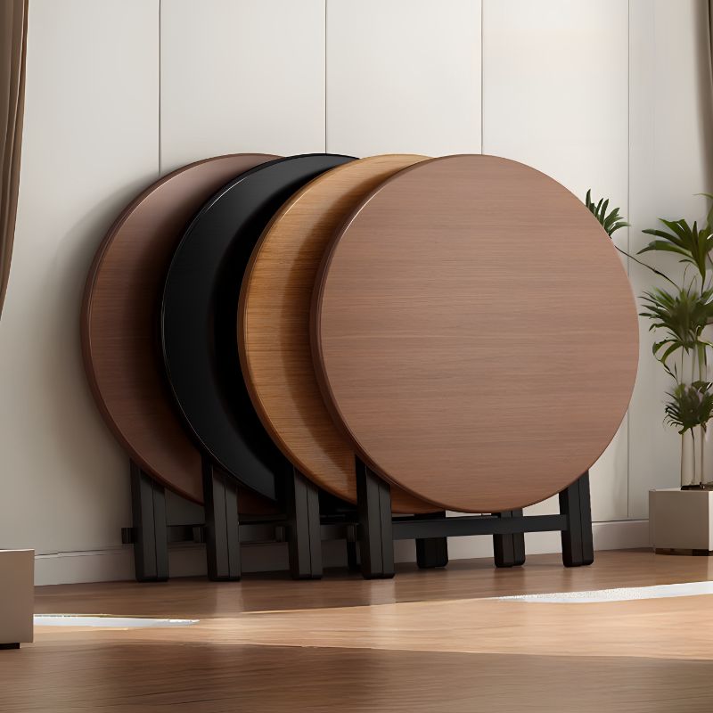 Minimalist SpaceSaver Orbicular Flip-top Table in Black with Rust Resistant Faux Wood Top