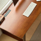 Casual Writing Desk with Built-in Outlets, Rust Resistant Sleigh Base, and Ink/Light Brown/Natural Pine Wood Top