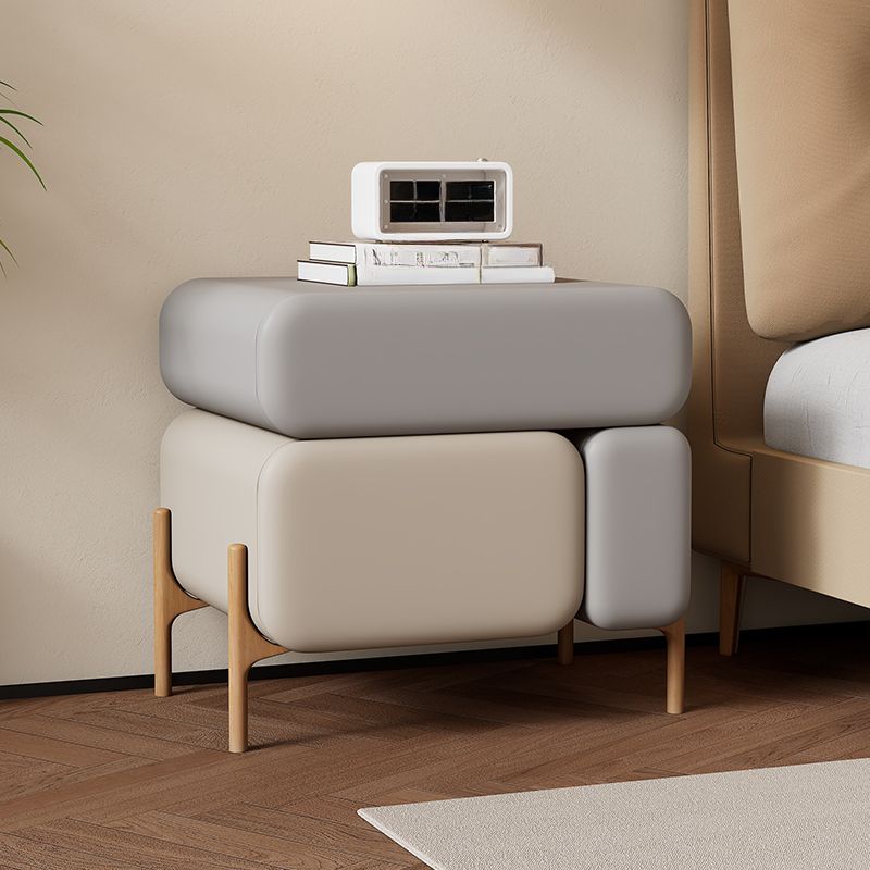 Modish Nightstand With Drawer Organization Featuring 3 Drawers and Pleather Countertop with Leg