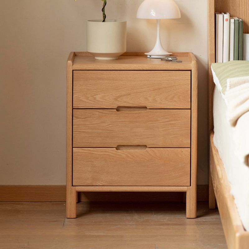 Victorian Nightstand With Drawer Organization Featuring Natural Wood Countertop
