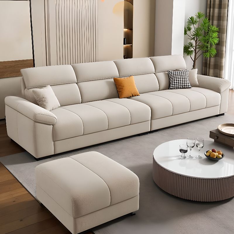 Standard Sofa in Tan with Armrest and 3 Pillows