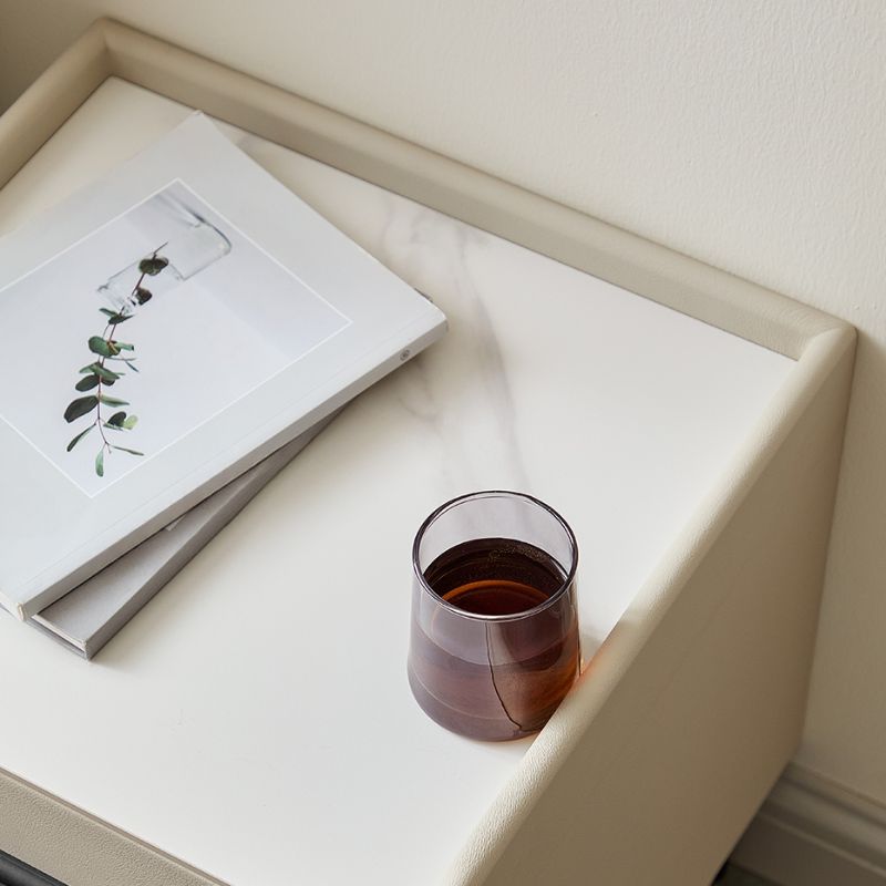 Modish Nightstand With Drawer Organization and Elegant Stone Countertop