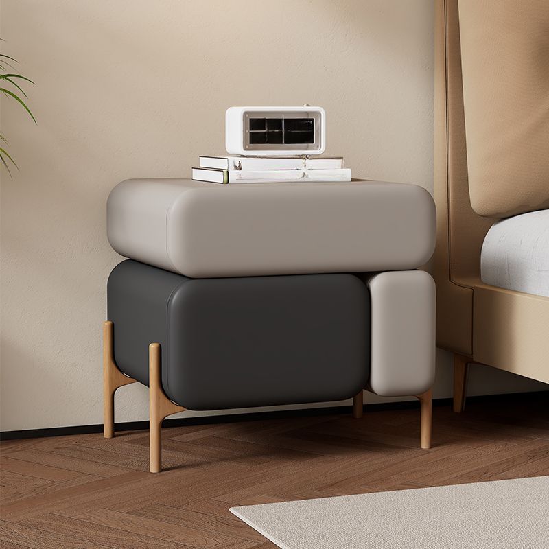 Modish Nightstand With Drawer Organization Featuring 3 Drawers and Pleather Countertop with Leg