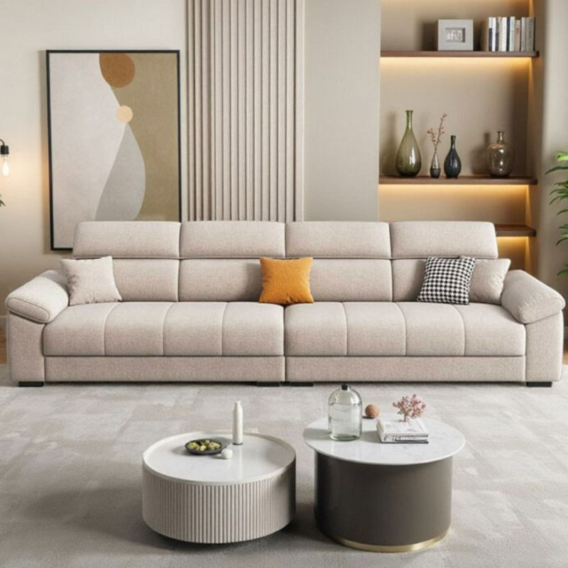 Standard Sofa in Tan with Armrest and 3 Pillows