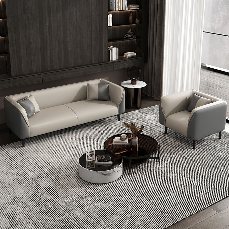 Contemporary Faux Leather Tuxedo Sofa with Water Resistant Design and Foam Seat Cushions