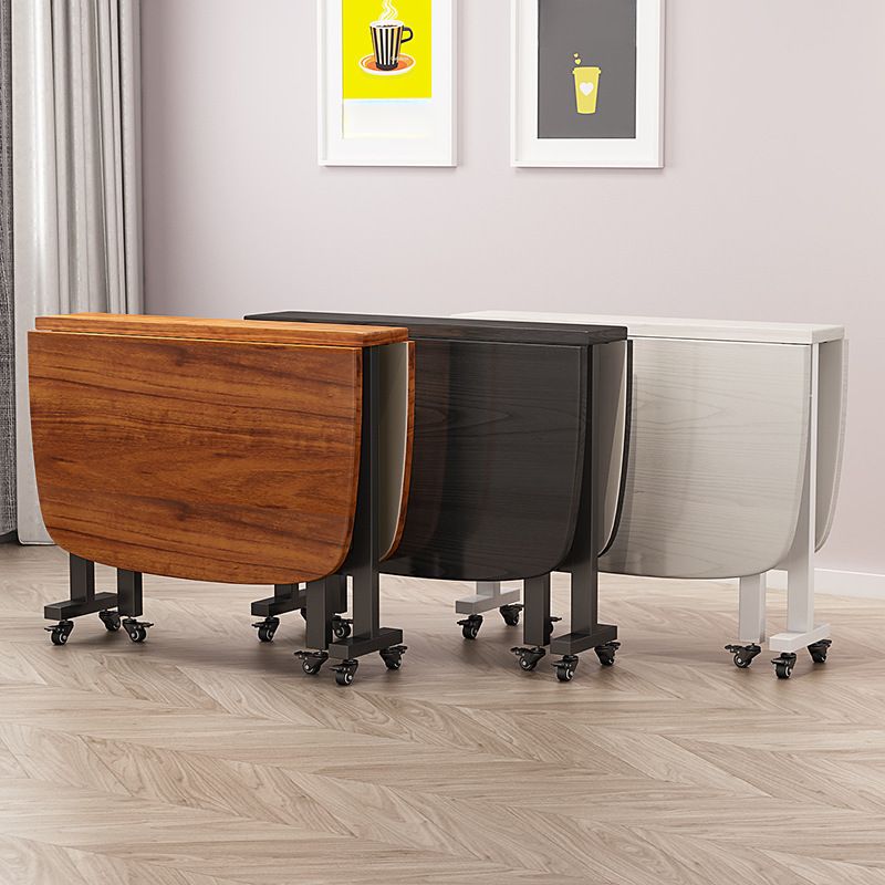 Trendy Casters Rectangle Foldable Banquet Table in Midnight Black/White, Waterproof MDF Wood Top