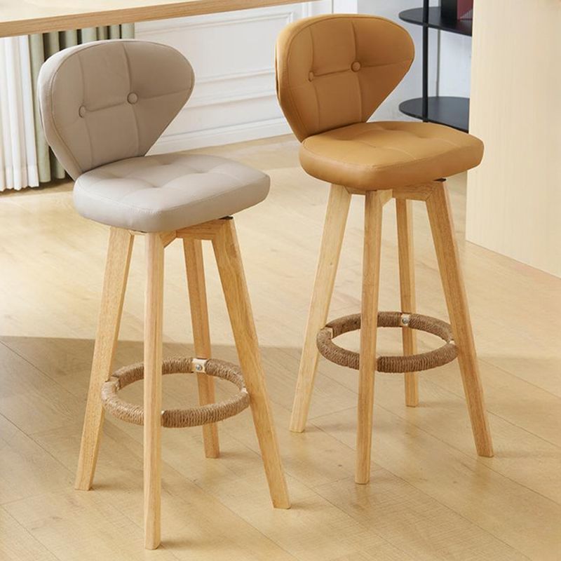 Casual Rawhide Bar Stools in Gray/Emerald Green/Caramel with Back, Turned Swivel, Rectangle Seat Style, and Leg Rest