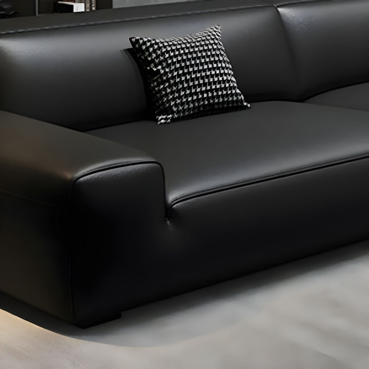 Extra Long Black Leather Sofa with Stain Resistant Feature and Two Pillows