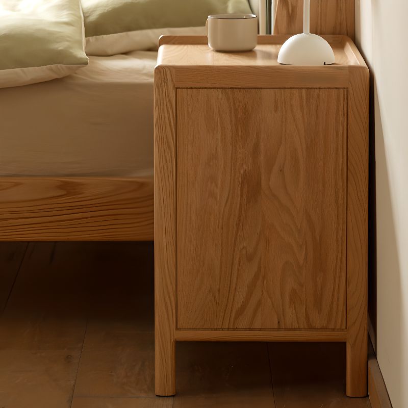 Victorian Nightstand With Drawer Organization Featuring Natural Wood Countertop