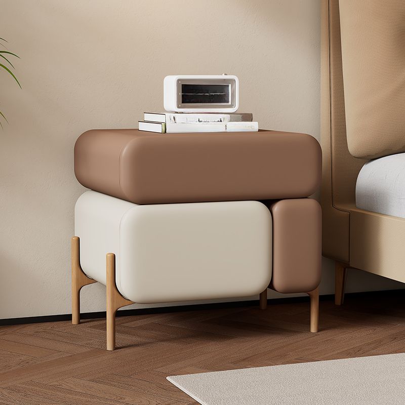 Modish Nightstand With Drawer Organization Featuring 3 Drawers and Pleather Countertop with Leg