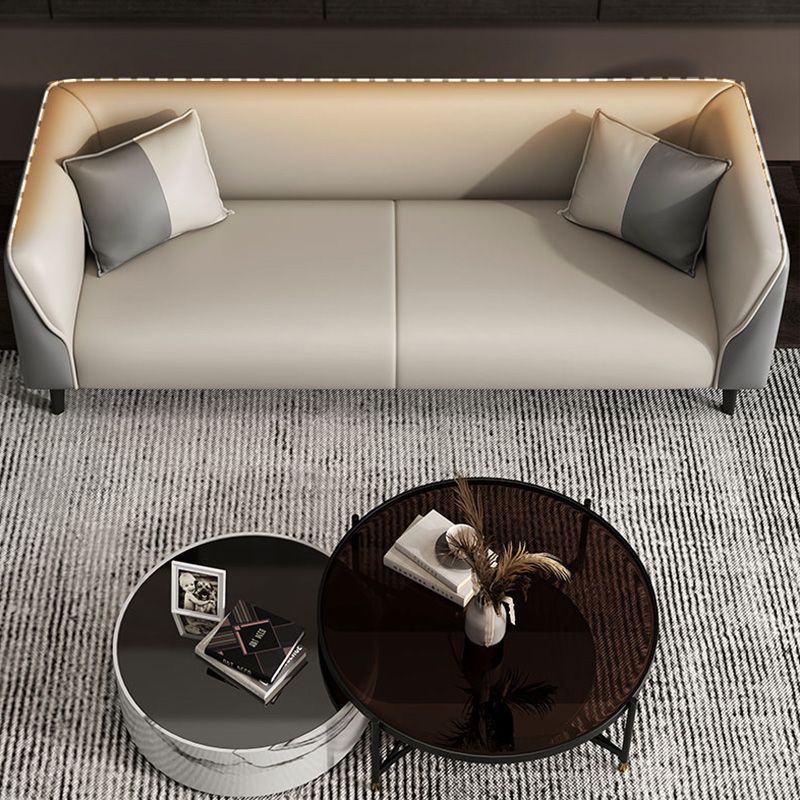 Contemporary Faux Leather Tuxedo Sofa with Water Resistant Design and Foam Seat Cushions