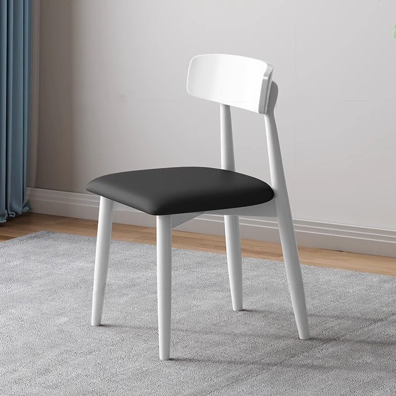 Casual Drawing Room Armless Chair with Ventilated Back, Padded Upholstery, Natural Wood Legs, and Foot Pads