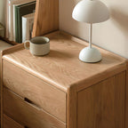 Victorian Nightstand With Drawer Organization Featuring Natural Wood Countertop
