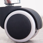 Minimalist Work Stool Moves Up and Down with Mid-Back, Swivel Rollers, and Moveable Design