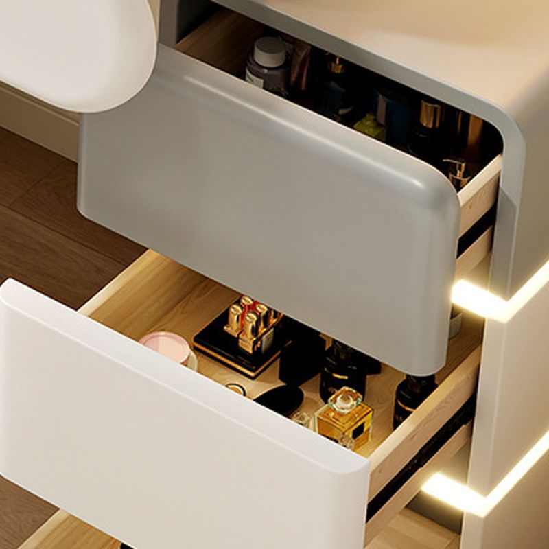 Modish Small Vanity Set with Stone Table Top, White Chair, 4 Drawers, and Light Up Mirror