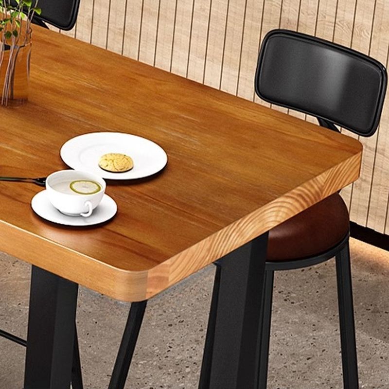 Minimalist Pub Table with Natural Wood Trestle Base in Auburn Rectangle and Foot Pedestal