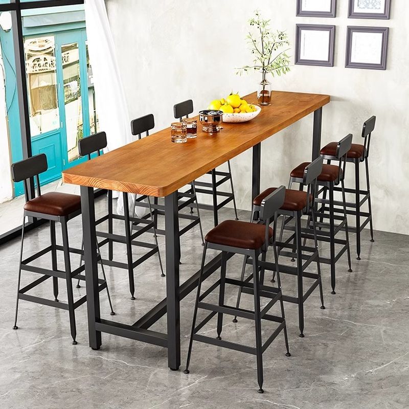 Minimalist Pub Table with Natural Wood Trestle Base in Auburn Rectangle and Foot Pedestal