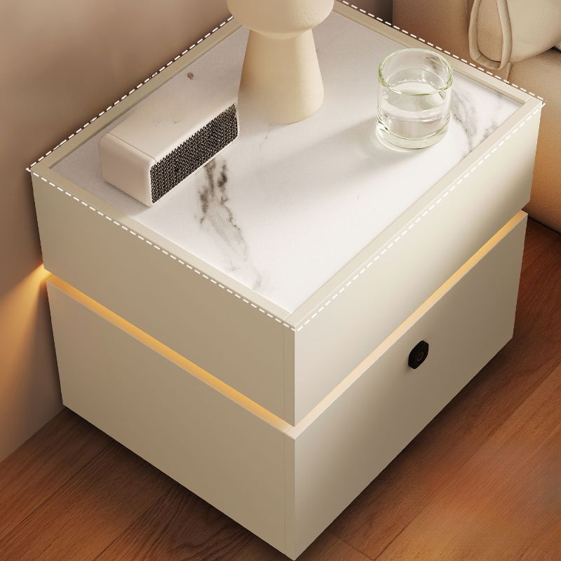 Modish Nightstand With Drawer Organization, Stone Countertop, and Illuminating Lighting