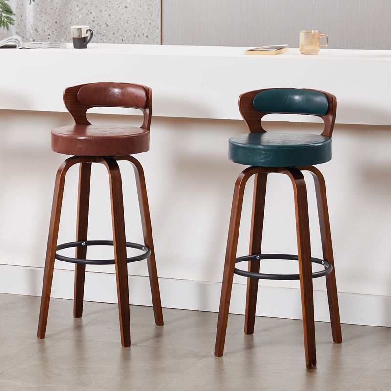 Casual Rawhide Bar Stools in Light Gray/Cream/Amber Color with Back, Turned Swivel, Round Top, and Leg Rest