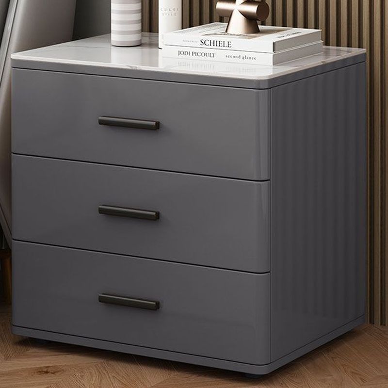 Modish Nightstand With 3 Drawers and Lumber/Stone Countertop, Featuring Leg