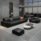 Extra Long Black Leather Sofa with Stain Resistant Feature and Two Pillows