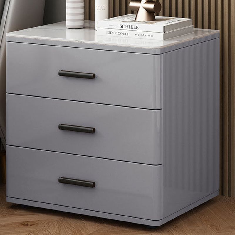 Modish Nightstand With 3 Drawers and Lumber/Stone Countertop, Featuring Leg