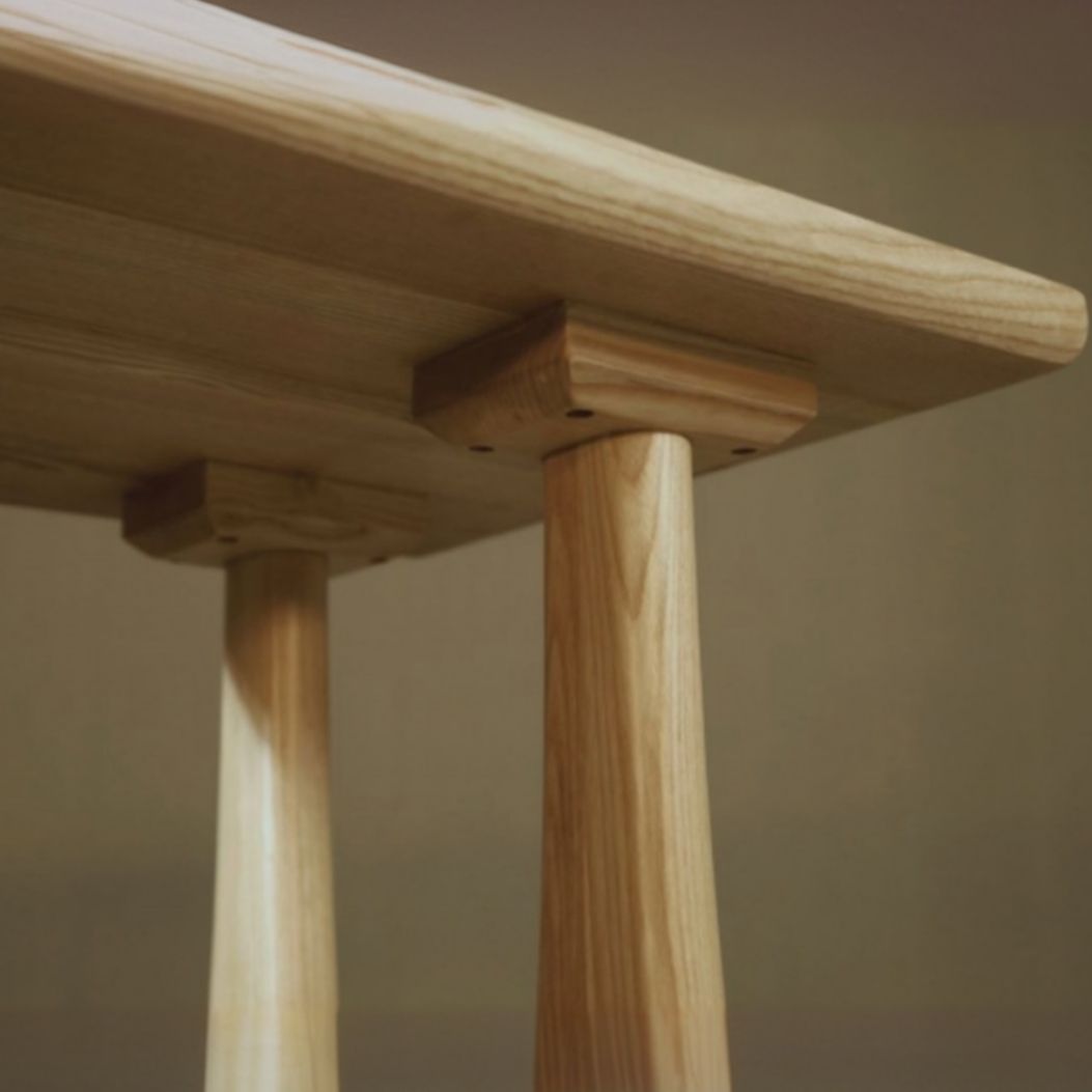 Coffee Wood/Natural Asymmetrical High Top Table in Natural Pine Wood with Three Legs and Upholstered Chair