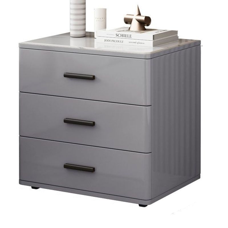 Modish Nightstand With 3 Drawers and Lumber/Stone Countertop, Featuring Leg