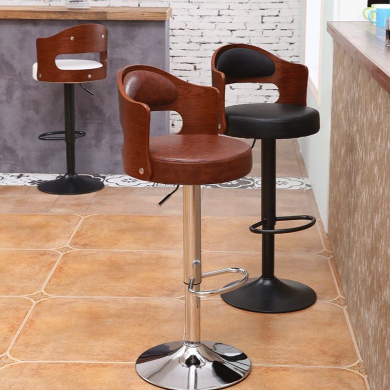 Casual Adjustable Lift Midnight Black/White/Cognac Rawhide Bar Stools with Back, Turned Swivel, and Round Top