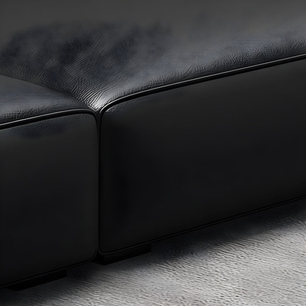 Extra Long Black Leather Sofa with Stain Resistant Feature and Two Pillows