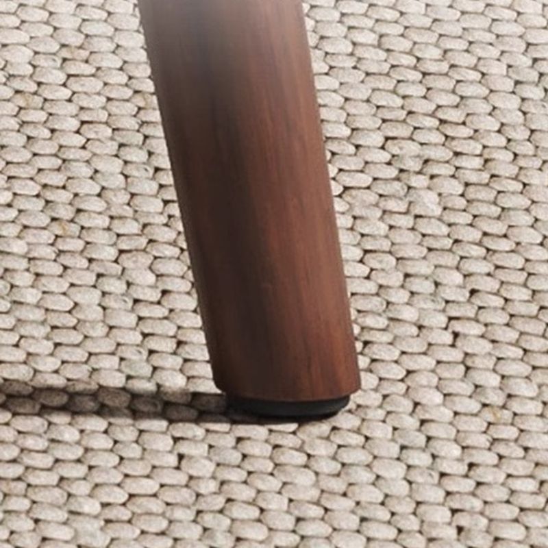 Casual Drawing Room Armless Chair with Ventilated Back, Padded Upholstery, Natural Wood Legs, and Foot Pads