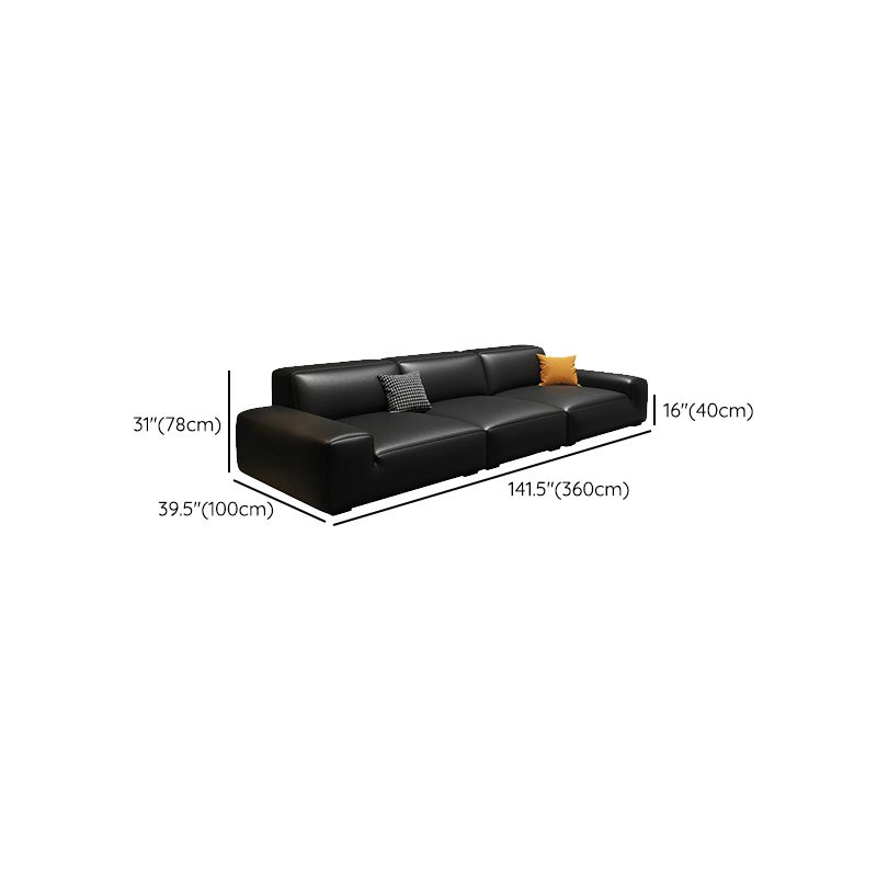 Extra Long Black Leather Sofa with Stain Resistant Feature and Two Pillows