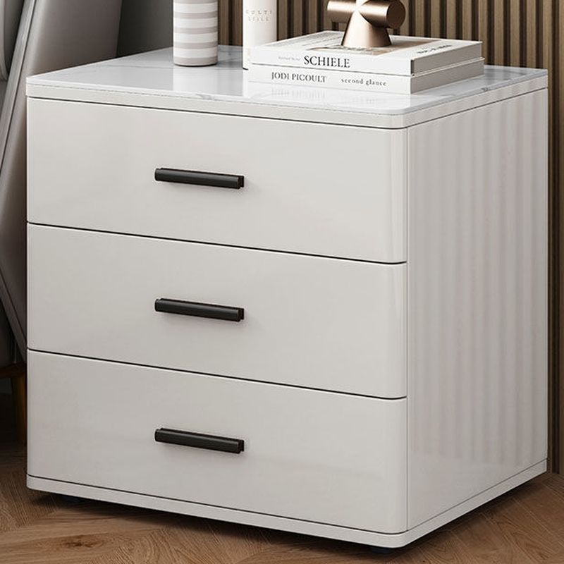 Modish Nightstand With 3 Drawers and Lumber/Stone Countertop, Featuring Leg