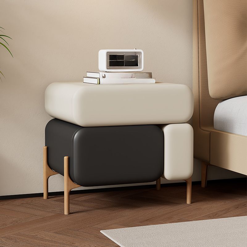 Modish Nightstand With Drawer Organization Featuring 3 Drawers and Pleather Countertop with Leg