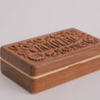 Close-up of Coco carved chocolate lid