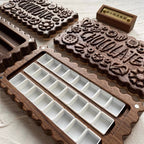 Open Cokkie walnut watercolor palette with 24 pans
