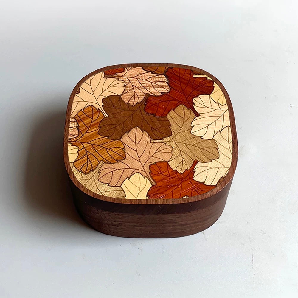 Laya walnut jewelry box with autumn leaf wood inlay