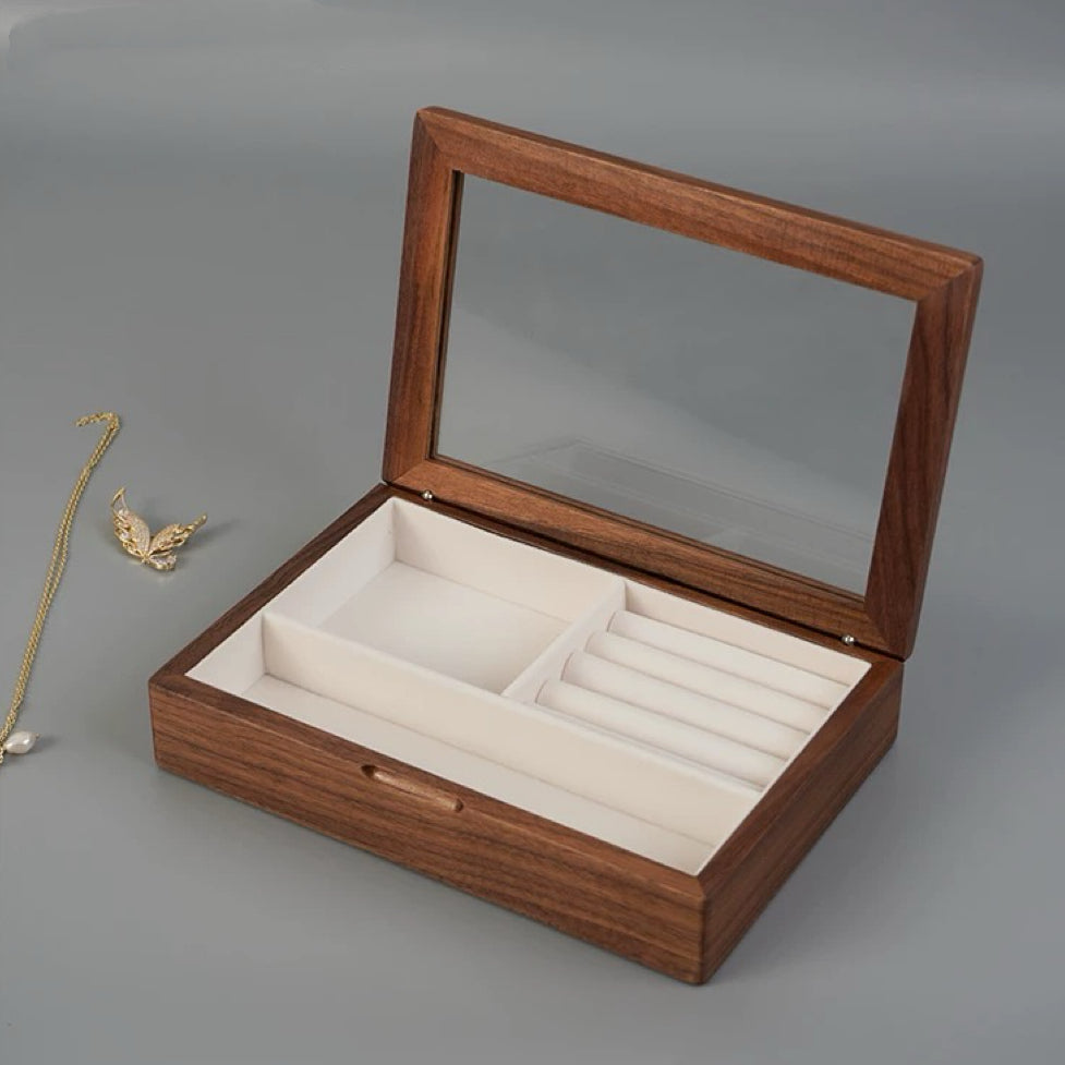 Empty open walnut Giselle box at an angle