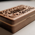 Coco carved lid and brass hinge detail
