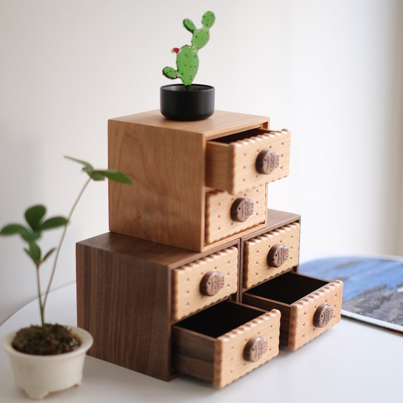 Open drawers in stacked Oudine cabinets